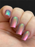 Iridescent multichrome nail polish on short square nails, purple with a vivid green glow