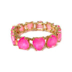 Gold-tone heart crystal linked stretch bracelet with bright pink faceted stones