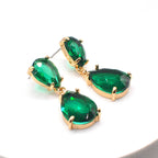 Teardrop dangle earrings with green faceted stones and gold-tone chain links