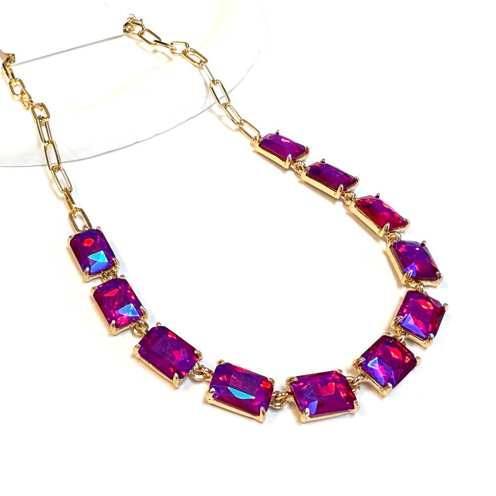 Gold-tone chain necklace with rectangular crystal links in fuchsia and purple AB color