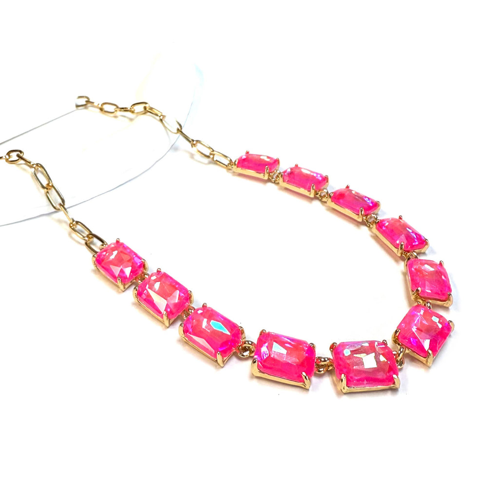 Gold-tone chain necklace with rectangular crystal links in bright pink AB color