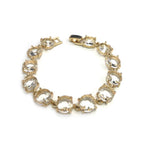 Clear round-cut crystal linked bracelet with gold-tone bezel settings
