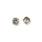 Round gray faceted glass stud earrings with sterling silver posts and gold-tone prongs