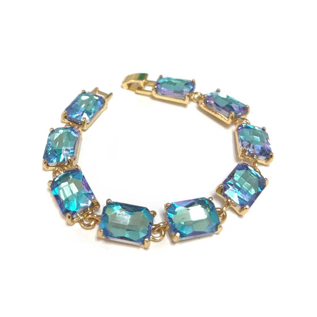 Gold-tone linked bracelet with emerald-cut aqua and teal crystal stones