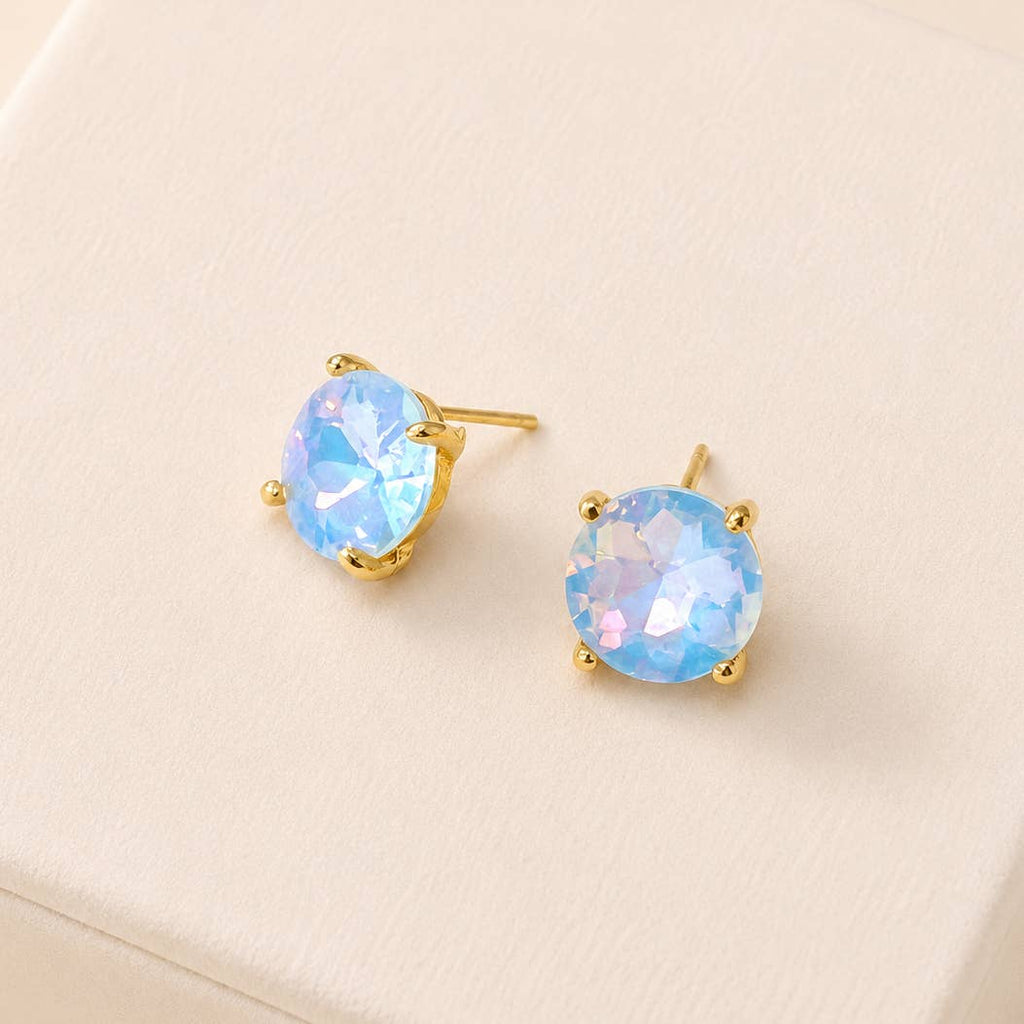 Sterling silver post round glass stud earrings with pale blue AB gemstone-style center