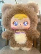 Brown hooded plush cat with glowing blue eyes, purple bow, and white paw plush