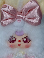 Close-up daisy fairy plush pendant face with large pink satin bow and fluffy white fur