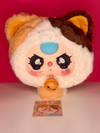 Cute plush cat zipper pouch with orange and brown face, blue eyes, orange zipper pull.