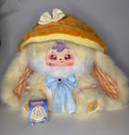 Plush rabbit fairy doll with orange hood, light-blue dress and bow, rabbit tail accents