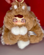 Plush bunny bag charm in caramel brown with white belly, glitter eyes, and keyring