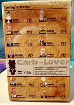 Carb-Lover figurine box back with "Today’s menu" grid and 1/44 label