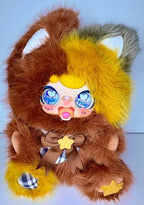 Fox plush with bright yellow and brown fur, blue galaxy eyes, star and bow detail