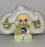 Front view green plush rabbit hoodie with glitter heart belly pouch and star-shaped details