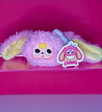 Pastel lavender plush hair scrunchie with cute face and bunny ear details