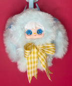 White plush rabbit pendant with blue eyes, yellow gingham outfit, and bunny tail