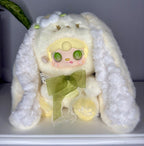 Front view white bunny plush with big eye face and green ribbon bow
