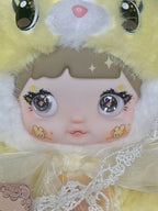 Plush mushroom doll face close-up with bunny cheek motifs and lace trim
