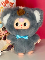 Elephant plush blind box character, gray fuzzy body, large ears, blue bow tie, cute face
