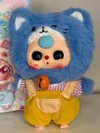Blue plush kitten doll with big oval eye, yellow overalls and star-striped sleeves