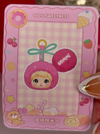 Plush pendant toy blind box in pink hood illustration on a square display card