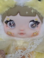 Plush mushroom doll face in hood with lace collar and embroidered eye details