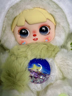 Close-up green plush rabbit hoodie with glossy blue eyes and glitter heart belly detail