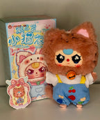 Orange plush kitten doll in yellow shirt and denim blue overalls, heart pendant