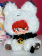 Plush designer blind box figure in white hood with red hair and black bow