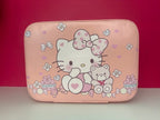 Pink hard-shell travel makeup case with Hello Kitty bow and heart print