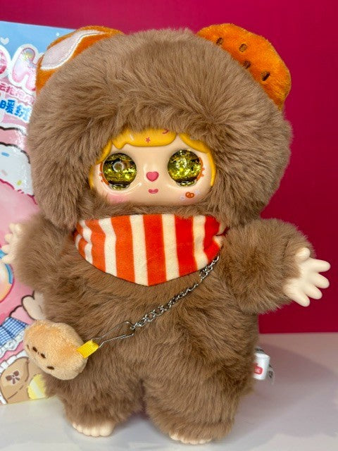 Brown mouse plush figure with glitter eyes, orange-striped scarf, chain across chest