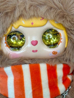 Brown mouse plush hood and glitter eyes with pink heart face and orange striped scarf