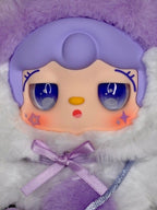 Purple plush cat face pendant close-up with blue eyes and a lavender ribbon bow.
