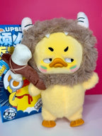Plush duck figure in gray lion-style hood holding a brown toy bone