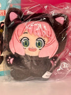 Plush character pendant with pink hair, green eyes, and dark outfit with ear accents