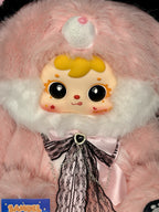 Pink plush bunny head with large black eyes, striped arms, velvet lace bow