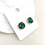 Round green glass stud earrings with sterling silver posts and gold-tone settings