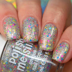 Holographic silver glitter nail polish on nails with Carnival bottle in frame