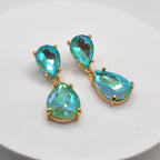 Gold-tone crystal teardrop dangle earrings with teal pear and teardrop stones