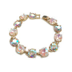 Gold-tone linked bracelet with pastel pink iridescent cushion-cut crystals