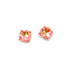 Sterling silver post round glass stud earrings with coral pink gemstone-style center