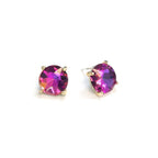 Sterling silver post round glass stud earrings with vivid purple gemstone-style center