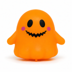 Orange squishy glow ghost with jack-o-lantern smile and two black eyes