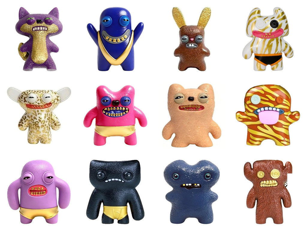 Set of 12 collectible monster toy figures in varied colors, shown together