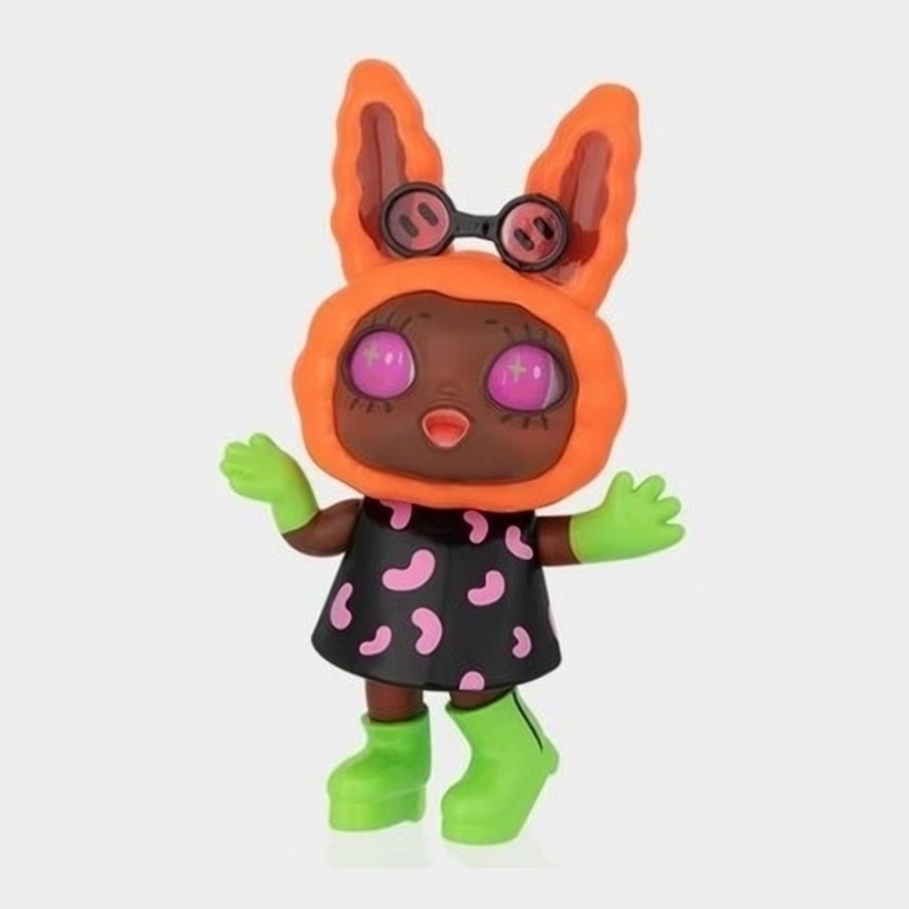 Orange bunny-eared collectible figure in black outfit with pink spots and green boots