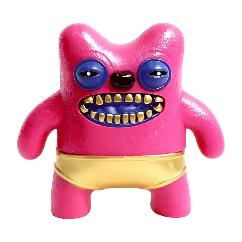 Pink plush-style collectible figure with blue eyes, black nose, and gold waist belt