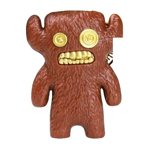 Brown plush-style collectible figure with gold eyes, angry grin, and raised arms