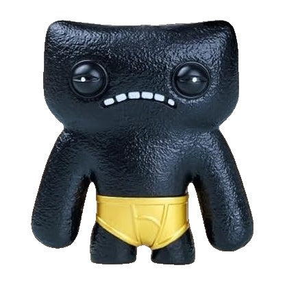 Black plush-style collectible figure with glowing eyes and yellow shorts
