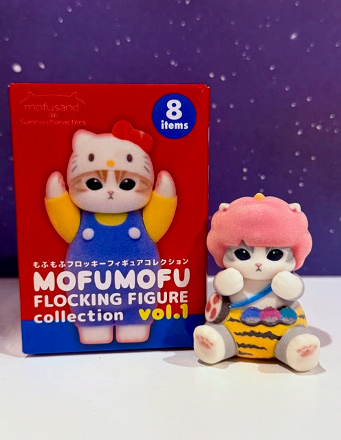 Flocked plush figure with red-and-blue box packaging, featuring pink cat character