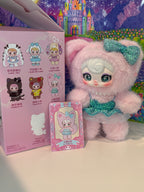 Pink plush cat keychain with turquoise bow and round face charm