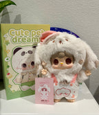 Sleeping puppy plush with white fur hood, large brown eyes and open arms; blind box included